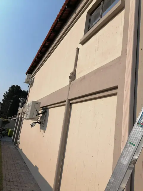 Exterior wall of a house with an external electrical box