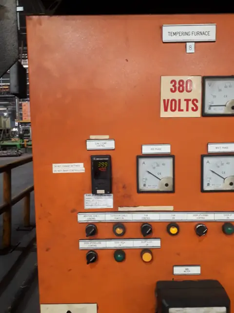 Orange industrial control panel for a tempering furnace, 380 V